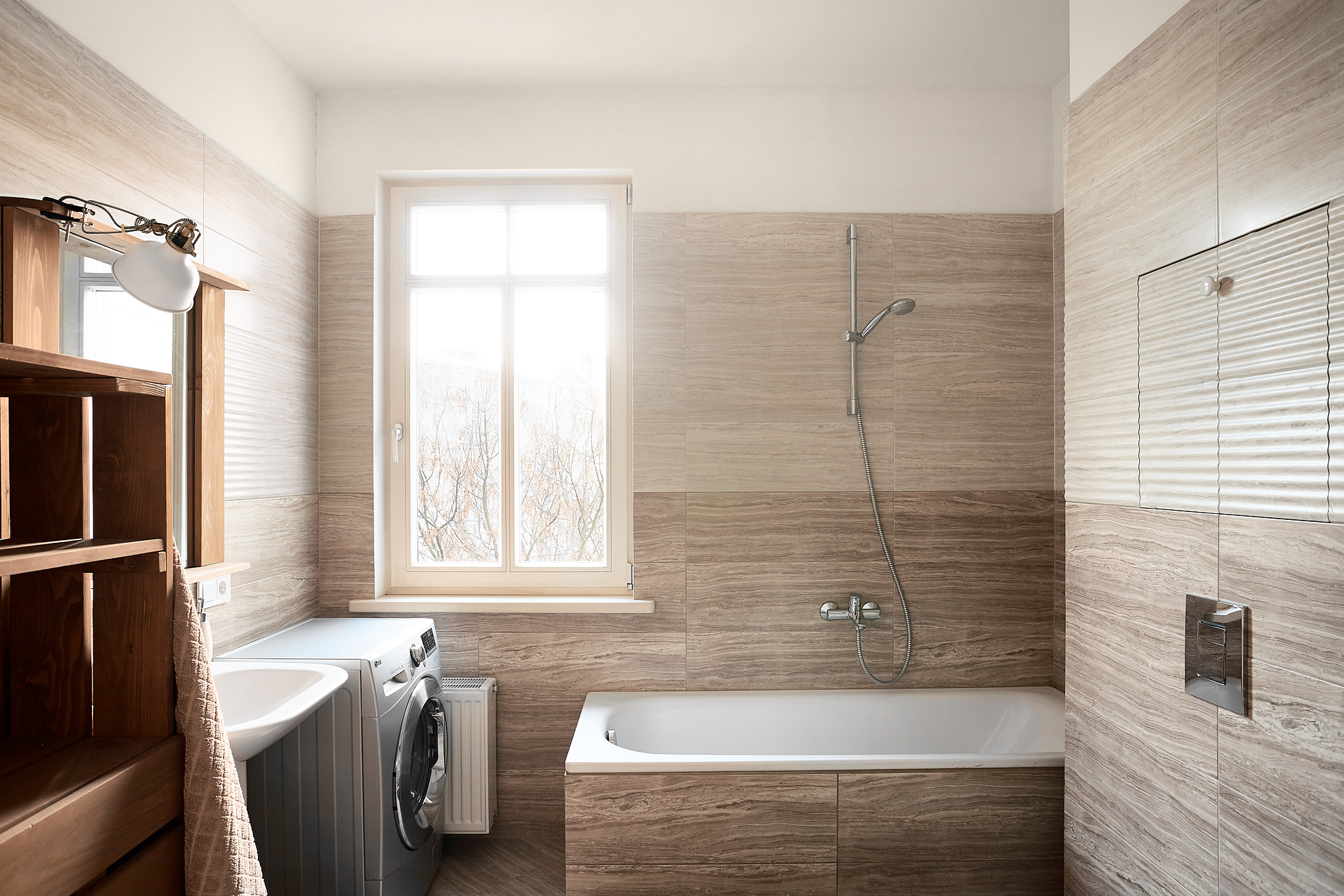 Brown tiles bathroom in Riga apartment to rent.